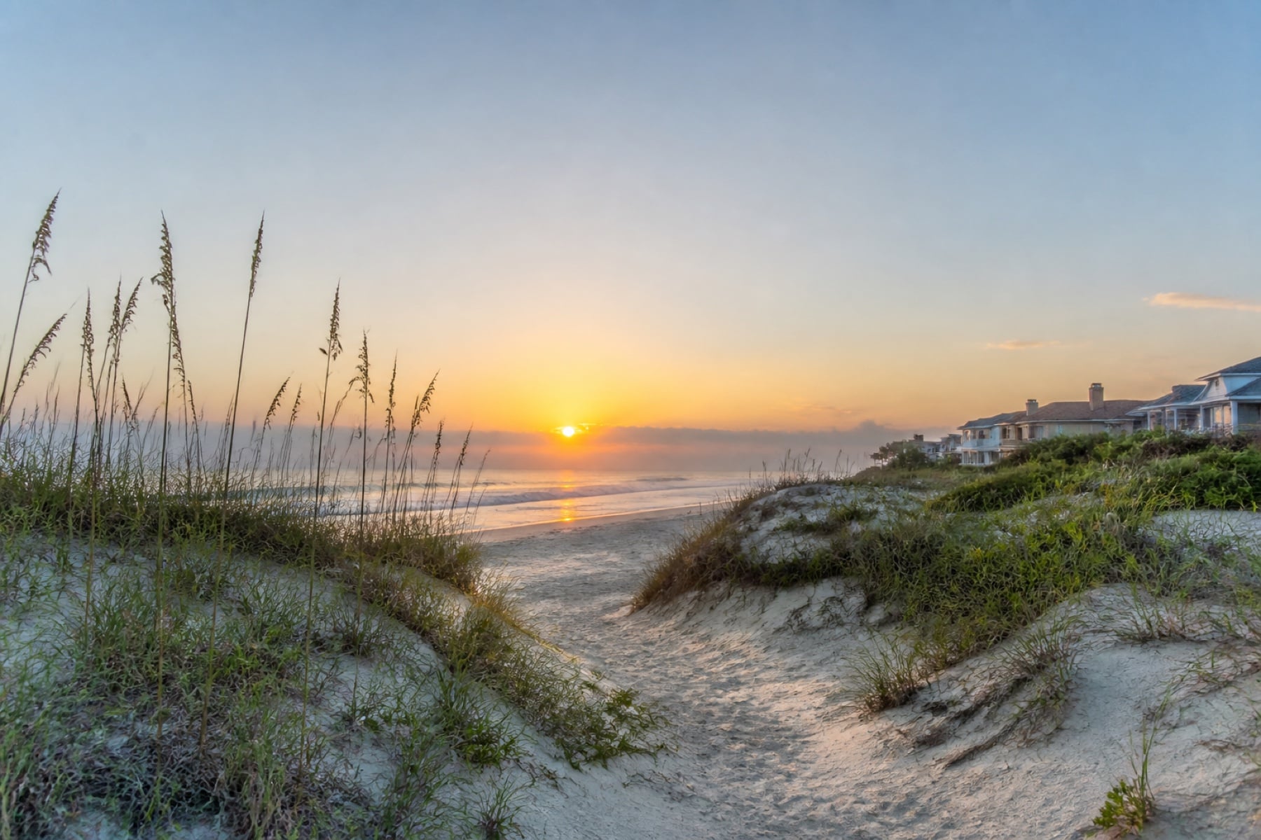 Ocean dunes, beach path and coastal homes in Ponte Vedra Beach at sunrise