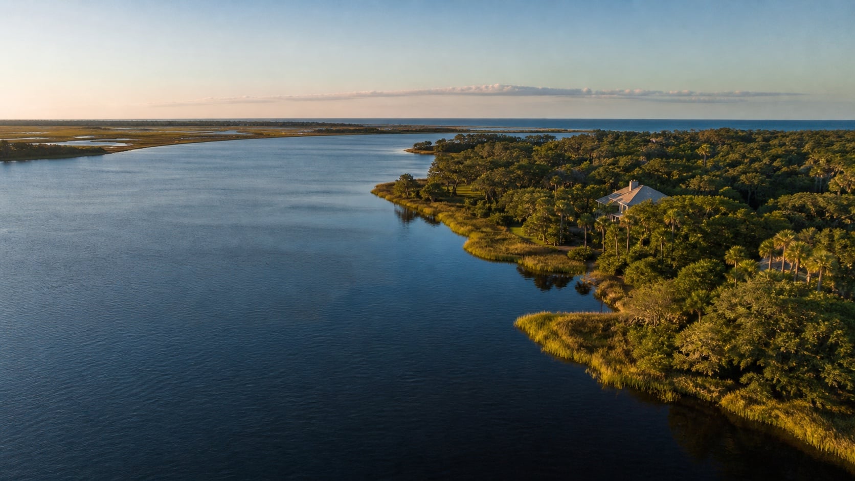 Coastal waterway and marsh landscape in St. Johns County at golden hour