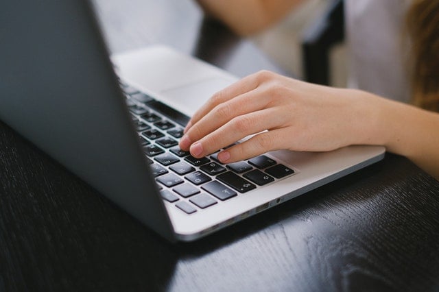 a person looking at a rental listing online