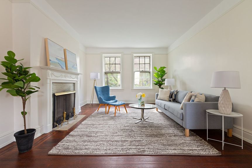 Living room with furniture and furnace