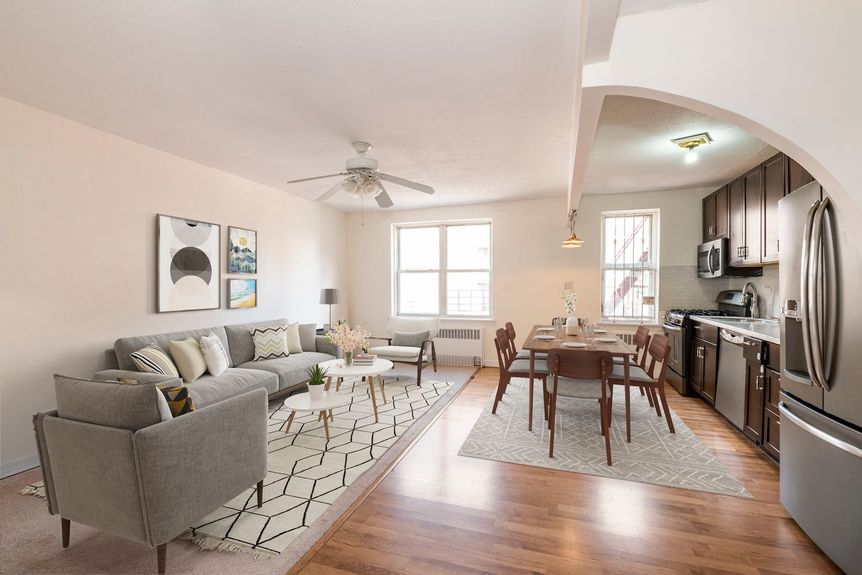 Living room with dining area and kitchen area