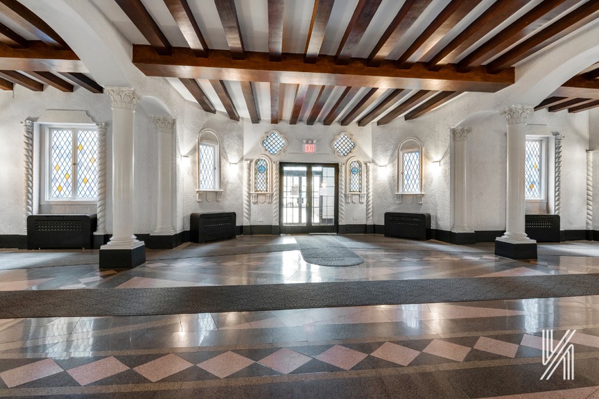 Spacious living room with a touch of wooden fixtures