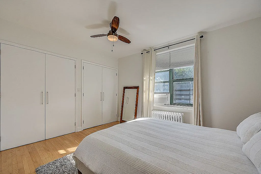 Master bedroom with fandelier