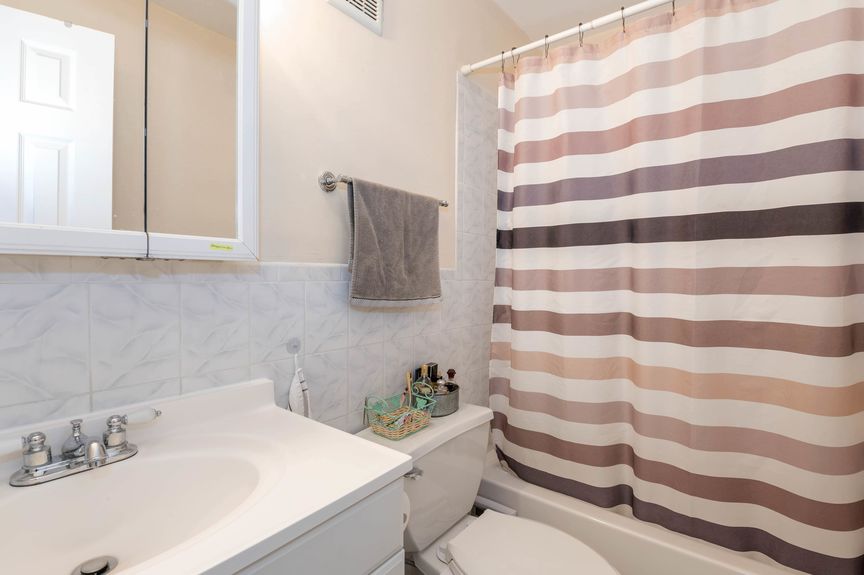 Bathroom with shower curtain