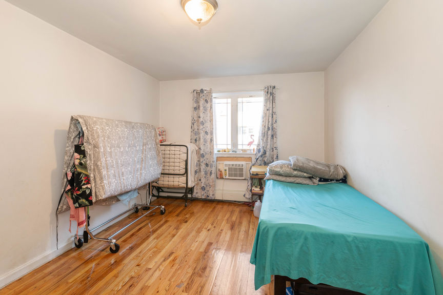 Bedroom with a sliding window