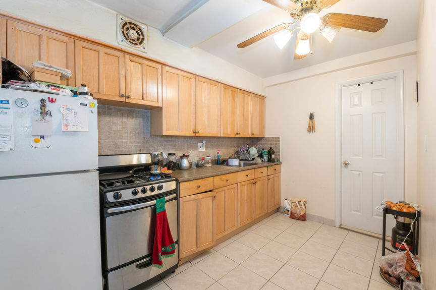 Kitchen with cupboards with appliances