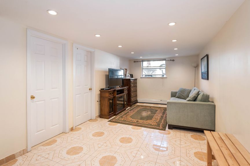 Living room with mat and sofa