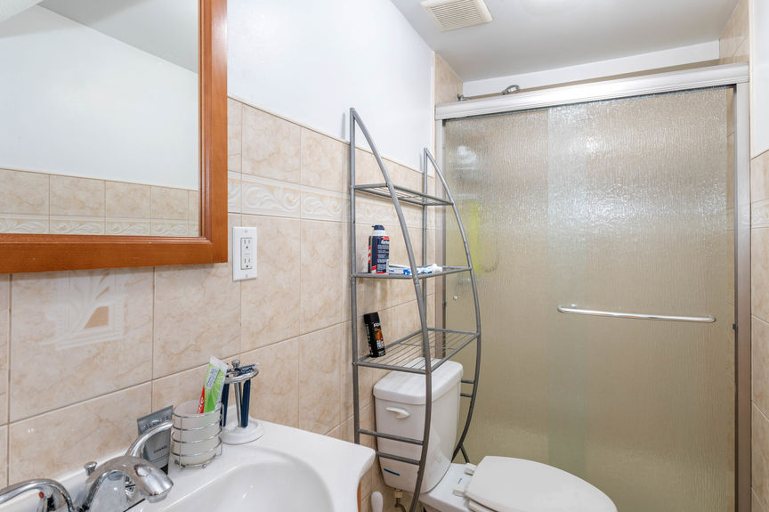 Bathroom with sink and mirror