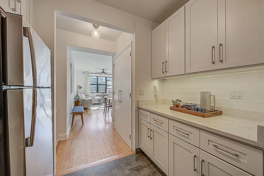 Kitchen area with cabinets