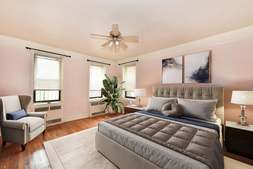 Master bedroom with fandelier and potted plant