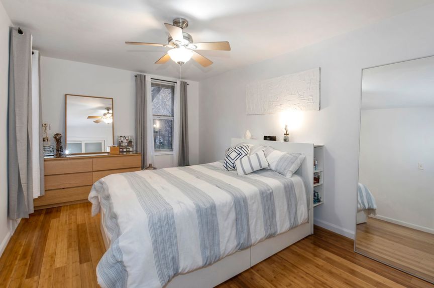 Bedroom with fandeliers