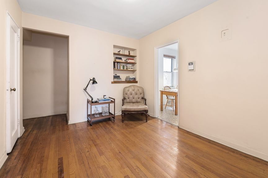 Sitting room with a chair and table