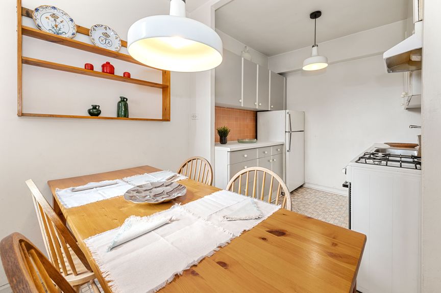 Eat-in-kitchen with a view of the fridge