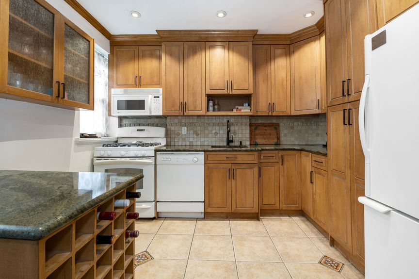 Kitchen with a stove, microwave, and dishwasher