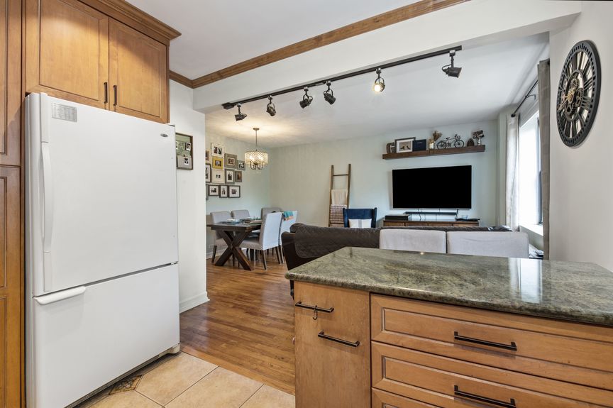 Kitchen with a view of the living room