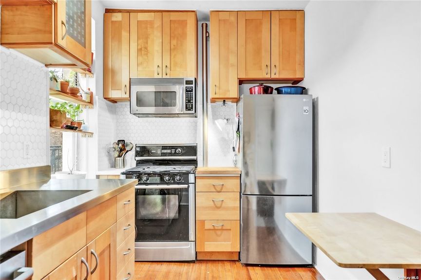 Kitchen with wooden cabinets
