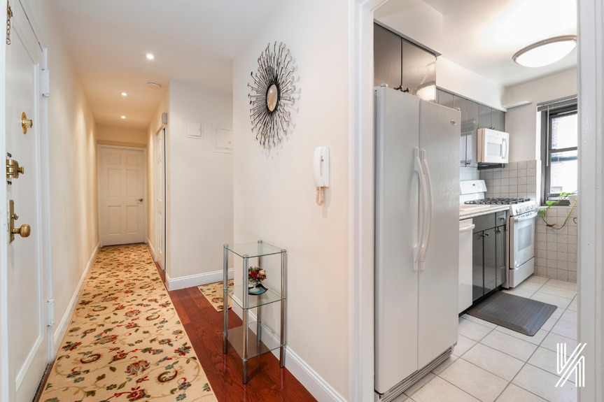 Kitchen view and hall way to the other rooms