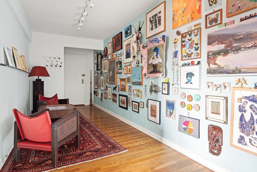 A beautiful foyer full of gallery art