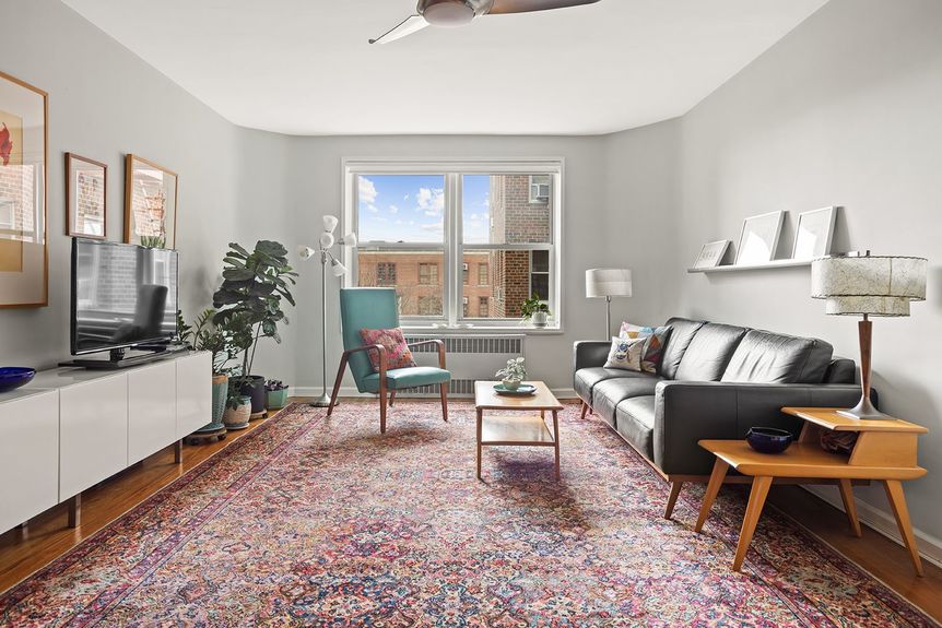 Spacious living room with a beautiful window