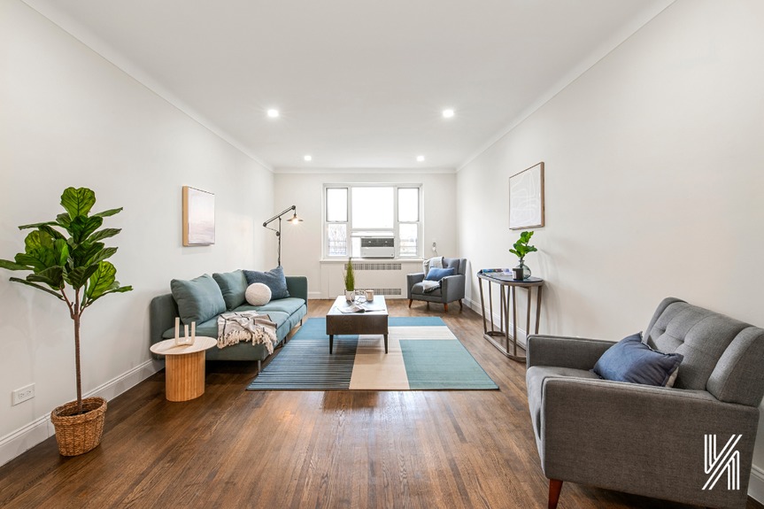 Main Living room with couch, single sofa, coffee table and window