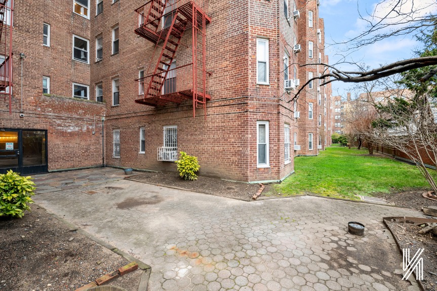 Outside apartment building with ladder