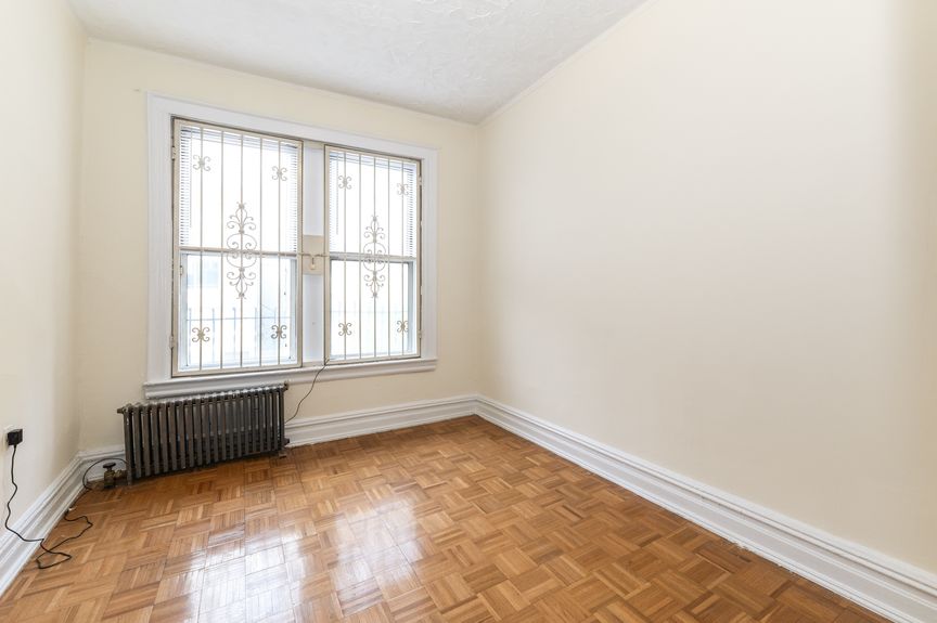 Living room photo of 32-10 35th St, 1F