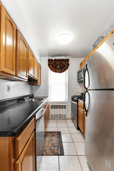 Kitchen photo of 33-04 93rd St, 1S in Jackson Heights