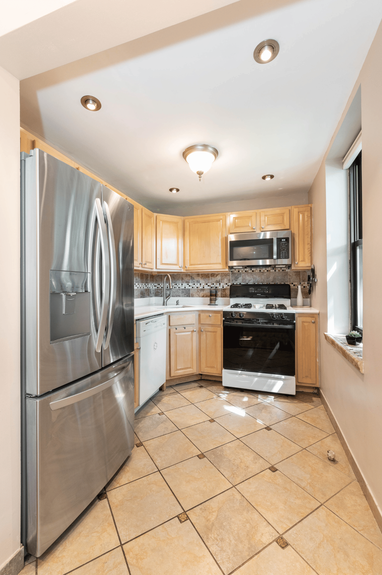 kitchen photo of 22-31 77th St, A2