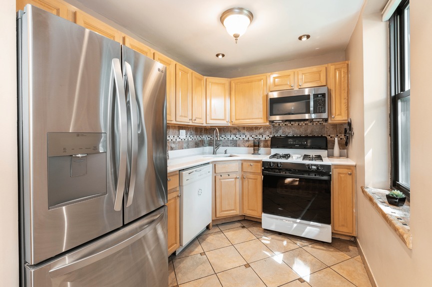 kitchen photo of 22-31 77th St, A2