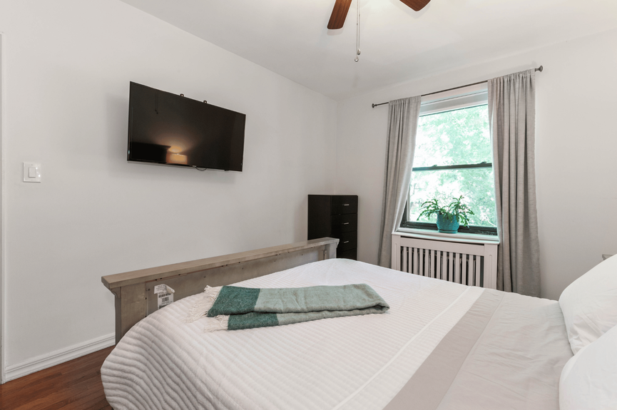 bedroom photo of 22-31 77th St, A2