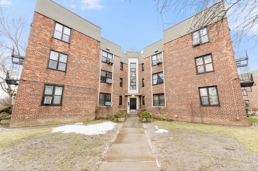 Building exterior at 22-60 79th St, Unit 3E, a condo apartment in Astoria, Queens (11370).