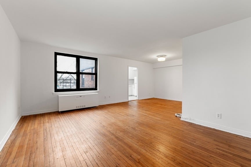 Living room at 22-60 79th St, Unit 3E, a condo apartment in Astoria, Queens (11370).