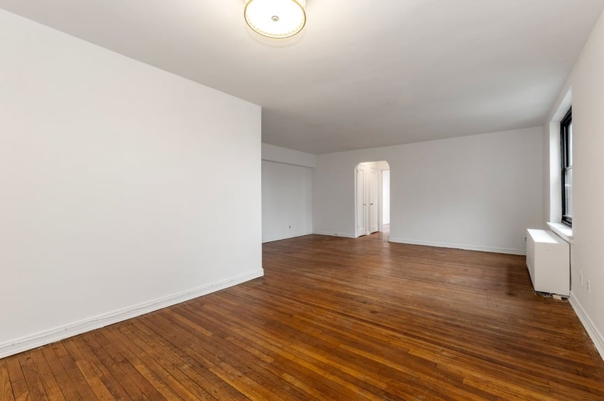 Living room at 22-60 79th St, Unit 3E, a condo apartment in Astoria, Queens (11370).