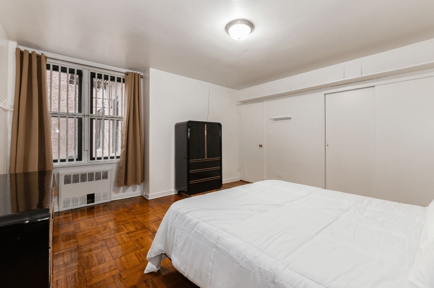 Bedroom at 33-24 Junction Blvd, Unit 1R, a co-op apartment in Jackson Heights, Queens (11372).