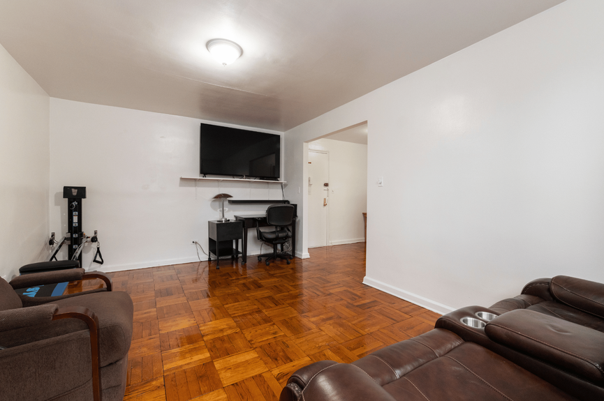 Living room at 33-24 Junction Blvd, Unit 1R, a co-op apartment in Jackson Heights, Queens (11372).