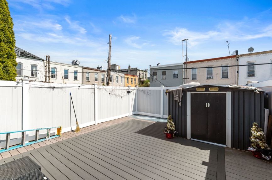 Backyard at 18-42 Norman St, a two-family house in Ridgewood, Queens (11385).