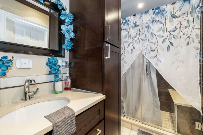 Bathroom at 18-42 Norman St, a two-family house in Ridgewood, Queens (11385).