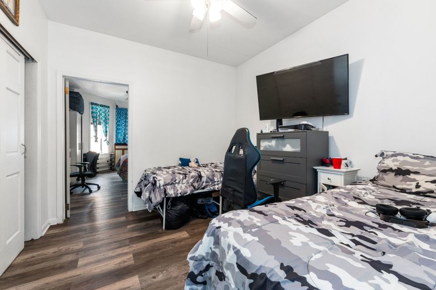 Bedroom at 18-42 Norman St, a two-family house in Ridgewood, Queens (11385).