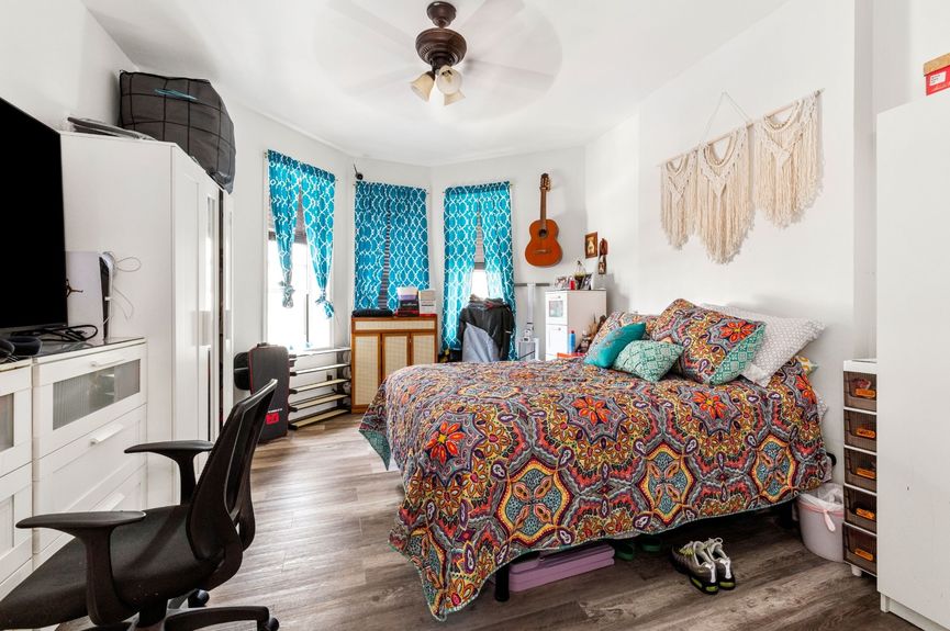 Bedroom at 18-42 Norman St, a two-family house in Ridgewood, Queens (11385).