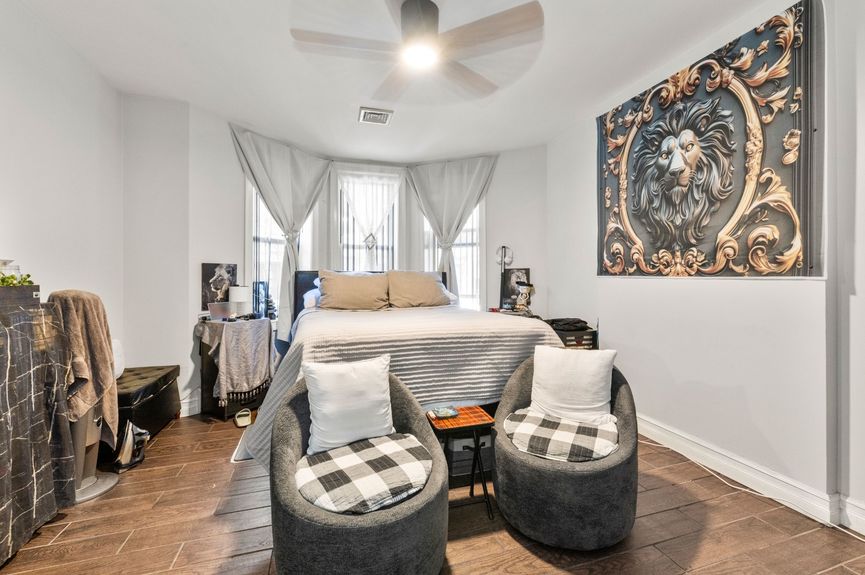 Bedroom at 18-42 Norman St, a two-family house in Ridgewood, Queens (11385).