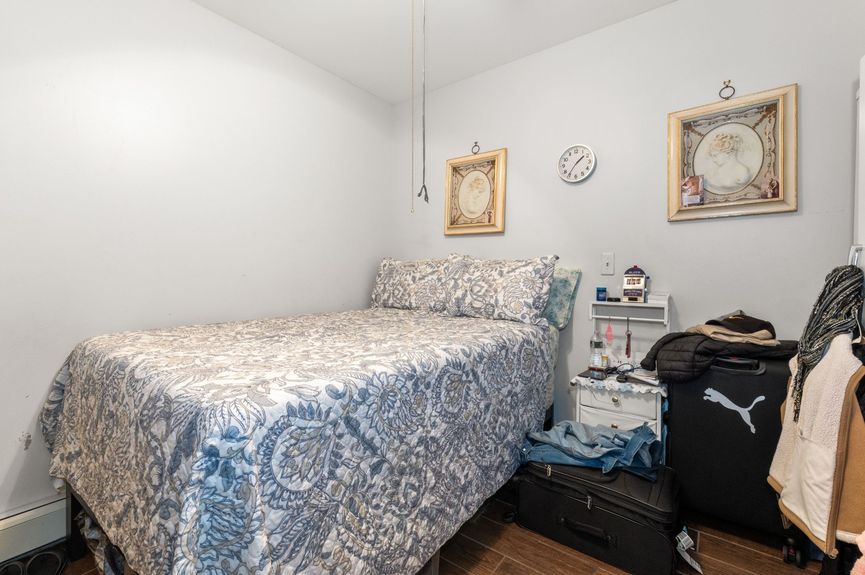 Bedroom at 18-42 Norman St, a two-family house in Ridgewood, Queens (11385).