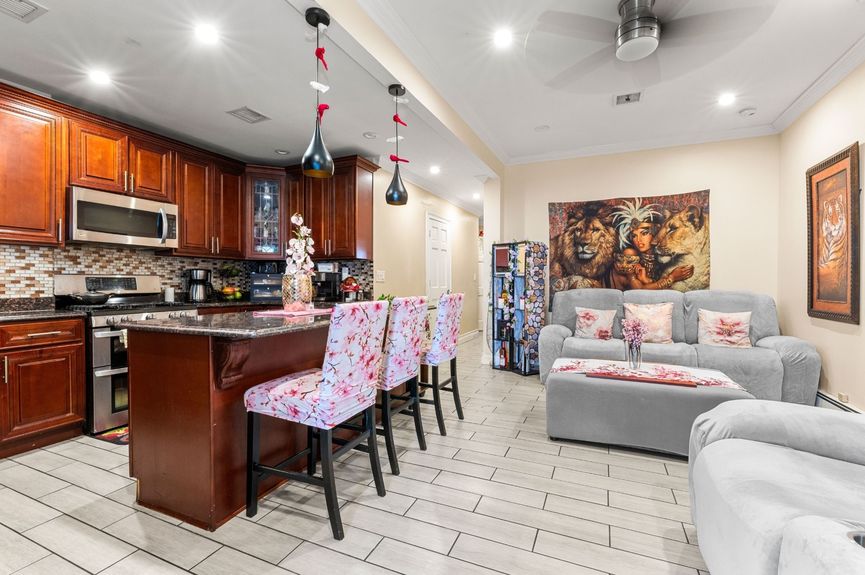 Living room at 18-42 Norman St, a two-family house in Ridgewood, Queens (11385).
