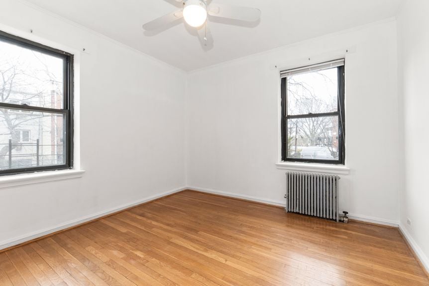 Bedroom at 22-43 77th St, unit C1, a condo apartment in Astoria, Queens (11370).