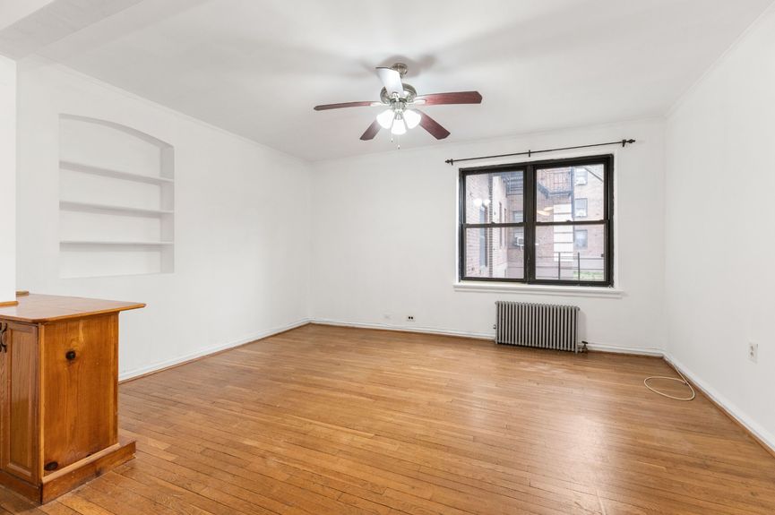 Living room at 22-43 77th St, unit C1, a condo apartment in Astoria, Queens (11370).