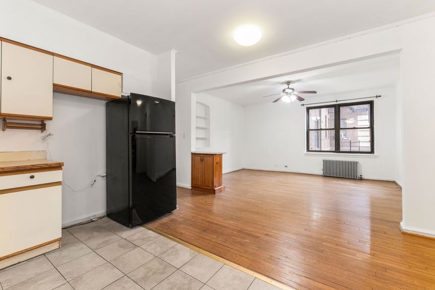 Living room at 22-43 77th St, unit C1, a condo apartment in Astoria, Queens (11370).