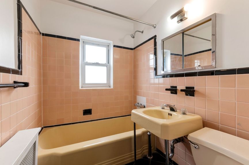 Bathroom at 20-29 28th St, a single-family home in Astoria, Queens (11105).