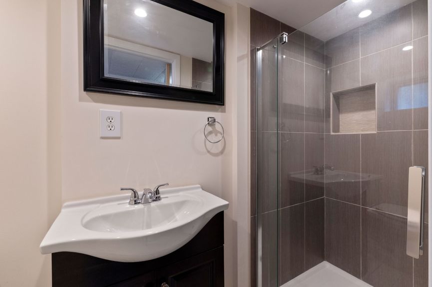 Bathroom at 20-29 28th St, a single-family home in Astoria, Queens (11105).