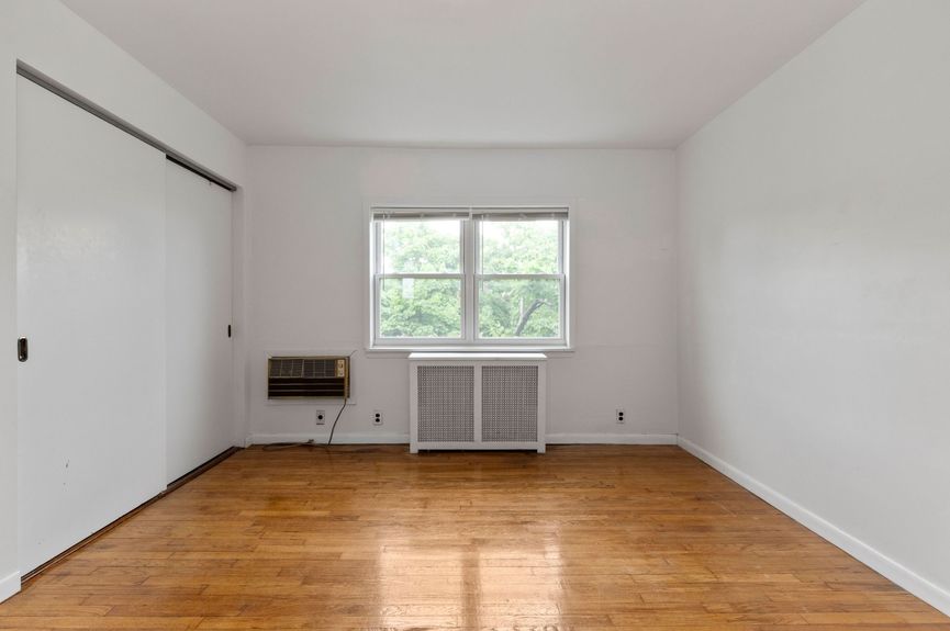 Primary bedroom at 20-29 28th St, a single-family home in Astoria, Queens (11105).