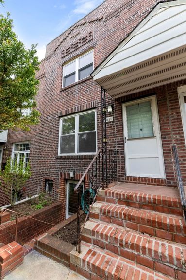 House exterior at 20-29 28th St, a single-family home in Astoria, Queens (11105).