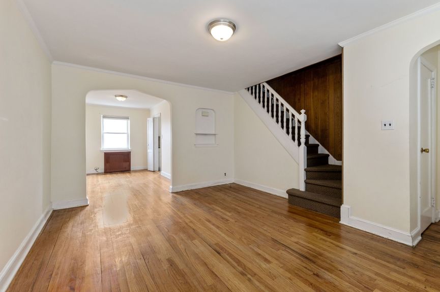 Living room at 20-29 28th St, a single-family home in Astoria, Queens (11105).